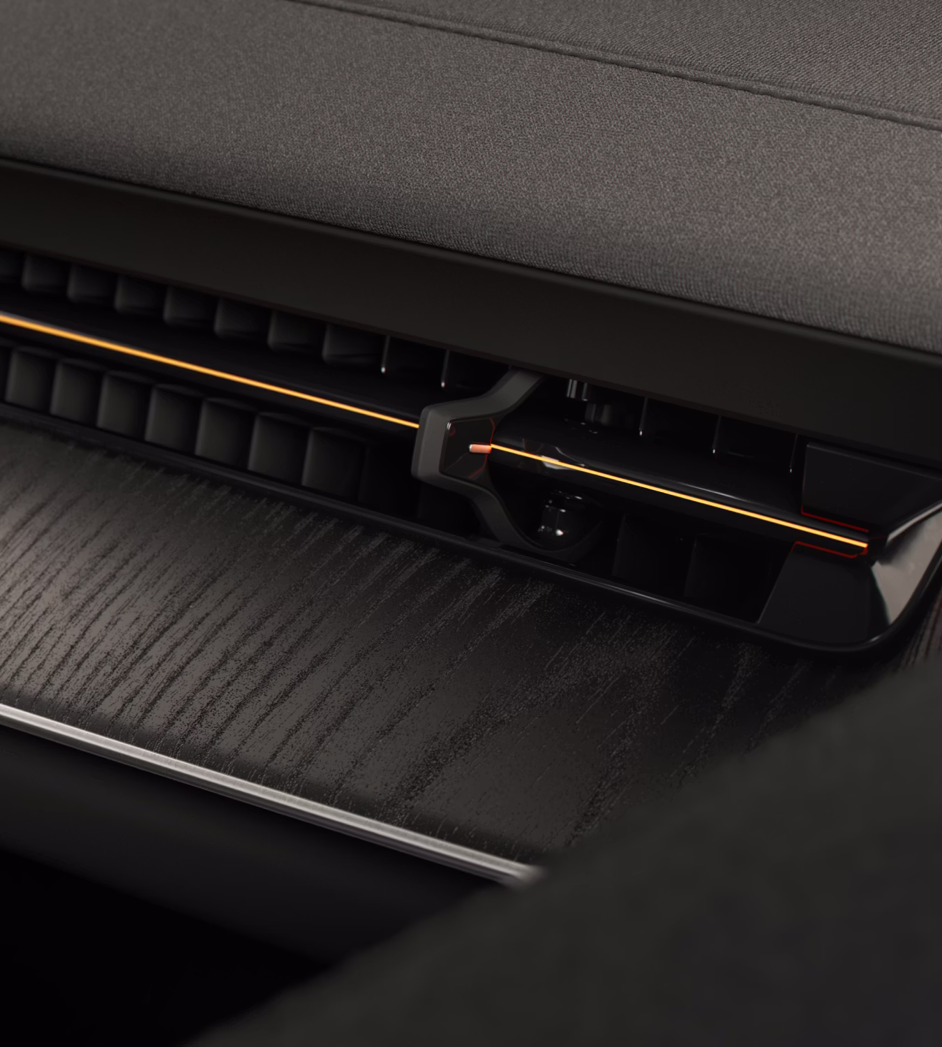 Close-up of Polestar 3’s Black Ash wood deco with a golden line across the ventilation.