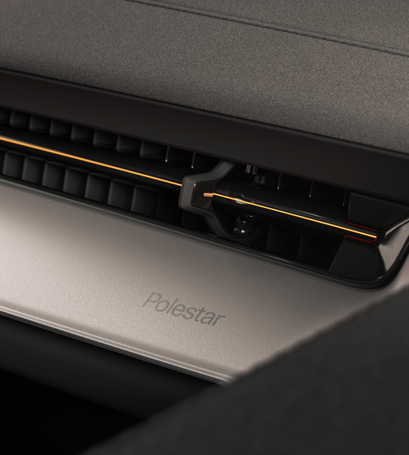 Close-up of Polestar 3’s Aluminium deco with a golden line across the ventilation.