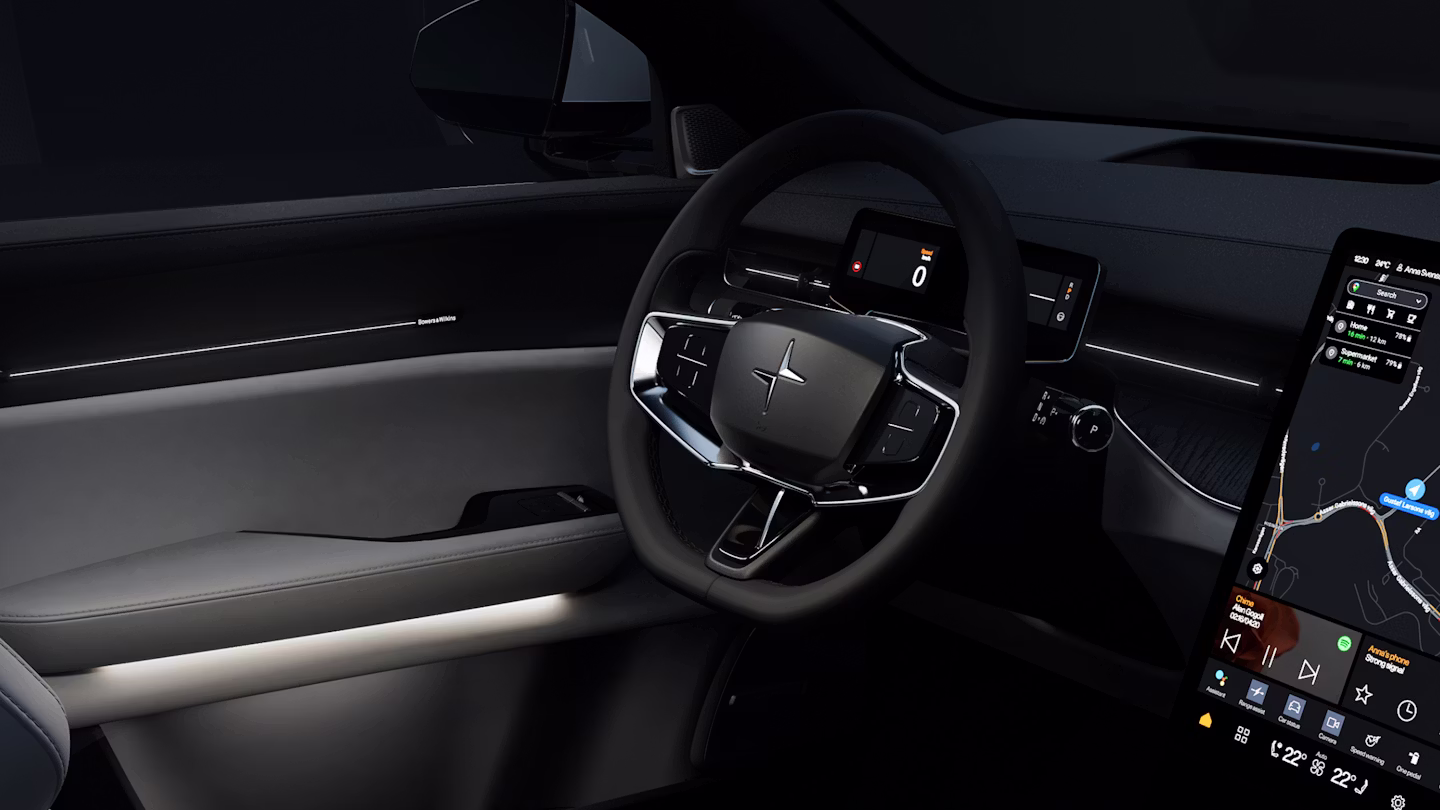 Polestar 3’s interior in a dark background lit up with its white, ambient interior lighting