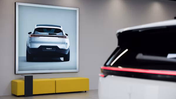 Polestar 3 in a space on a screen and a yellow bench