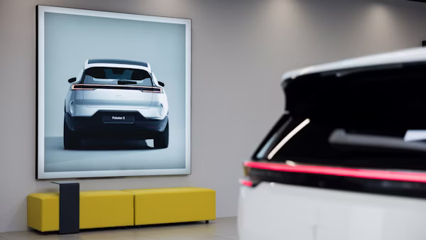 Polestar 3 in a space on a screen and a yellow bench