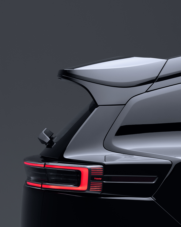 Rear view of Polestar 3 showing taillight and spoiler against a dark background.