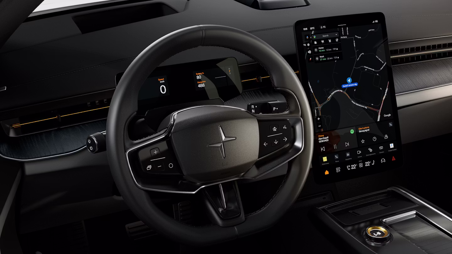 Polestar 3’s steering wheel, dashboard, and centre display showing the Google Play Store screen.