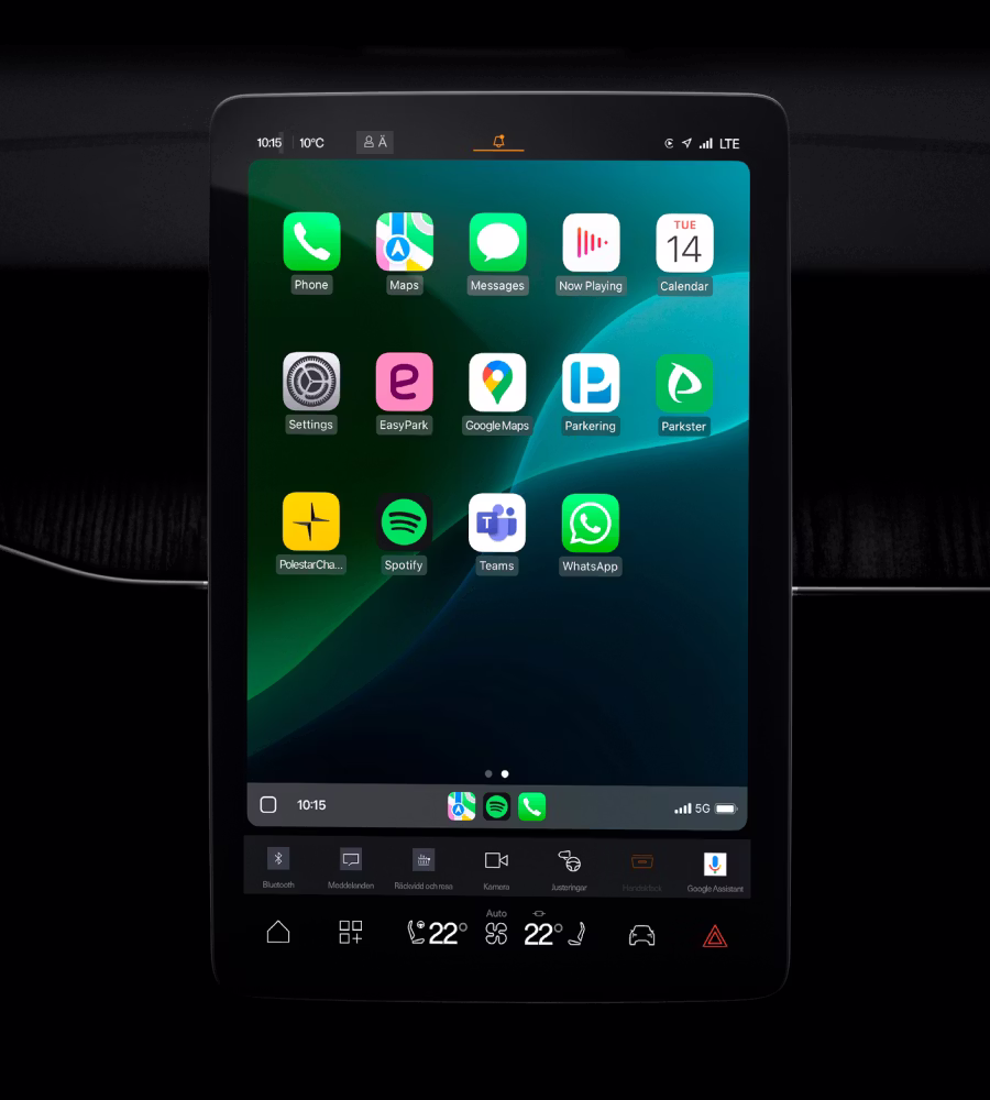 Polestar 3’s centre display showing the Appple CarPlay home screen with a green background.