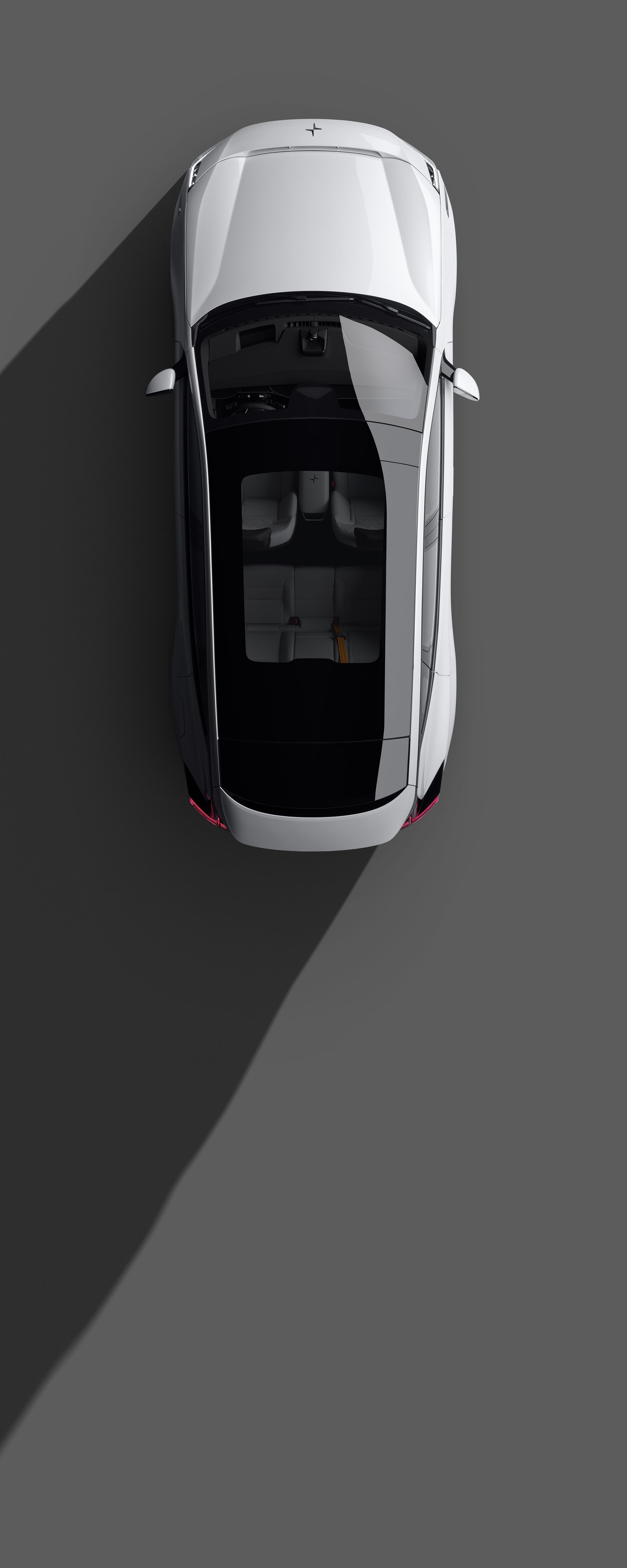 Bird’s eye view of Polestar 3 in a white colour against a grey background.