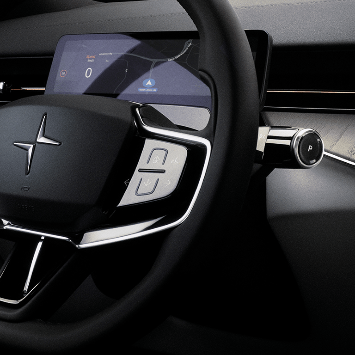 A close up of Polestar 3’s steering wheel with Polestar logo, indicator stalk, and buttons.