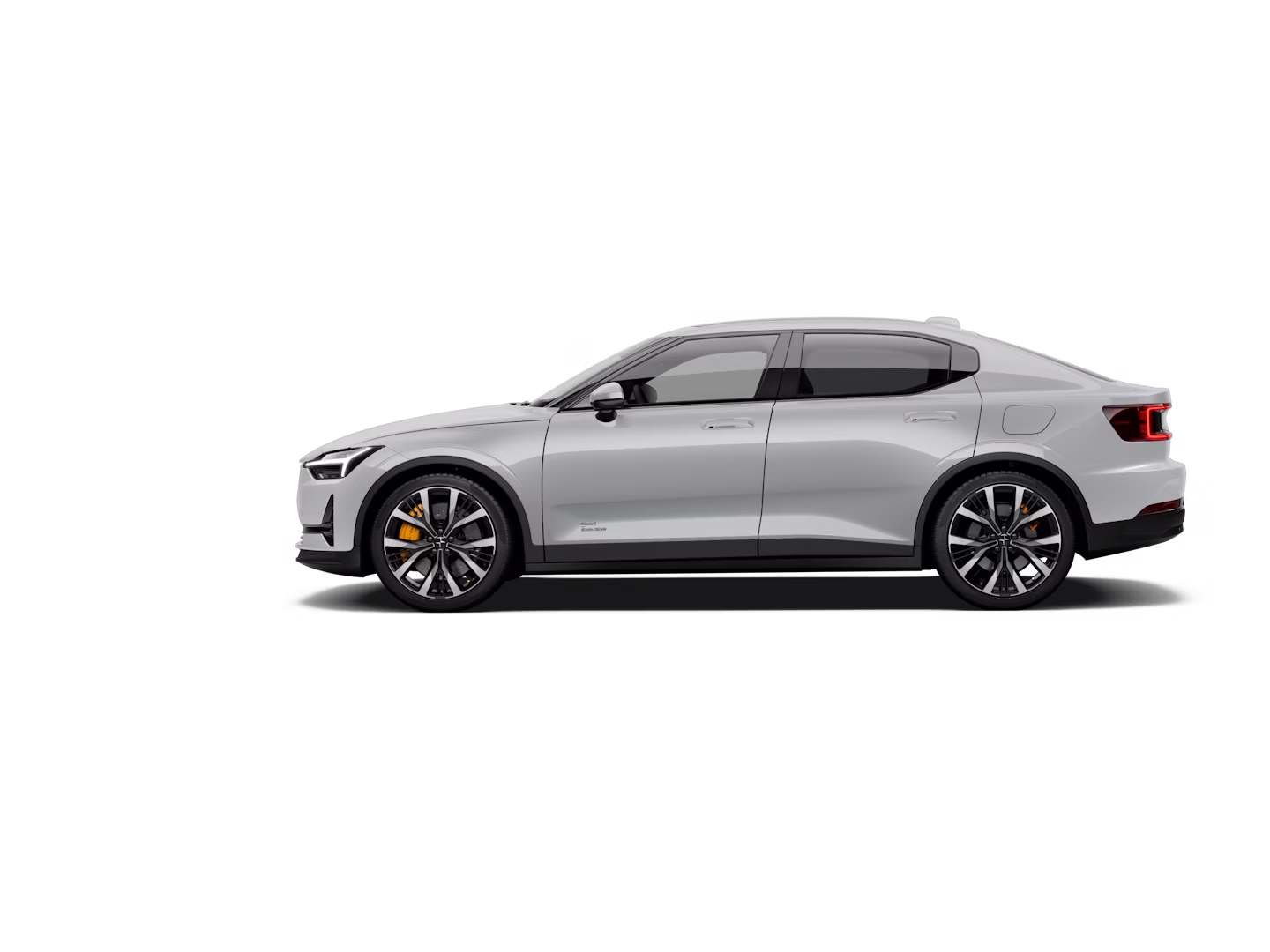 A side view of a light grey-coloured Polestar 2 facing left and standing against a white background.