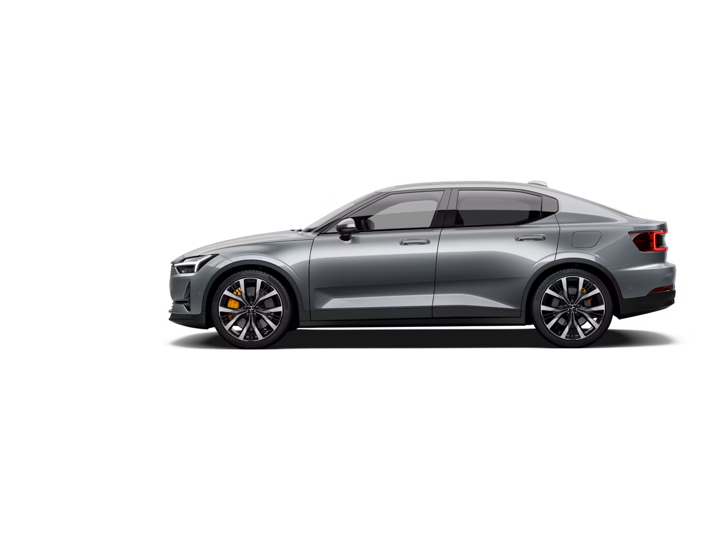A side view of a grey-coloured Polestar 2 facing left and standing against a white background.