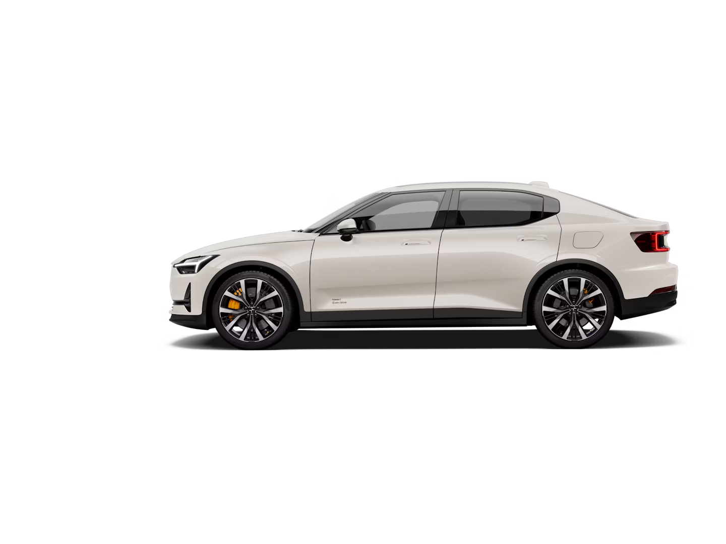 A side view of a sandy-brown Polestar 2 facing left and standing against a white background.