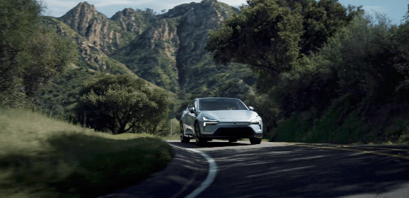 Polestar 4 driving on a winding mountain road
