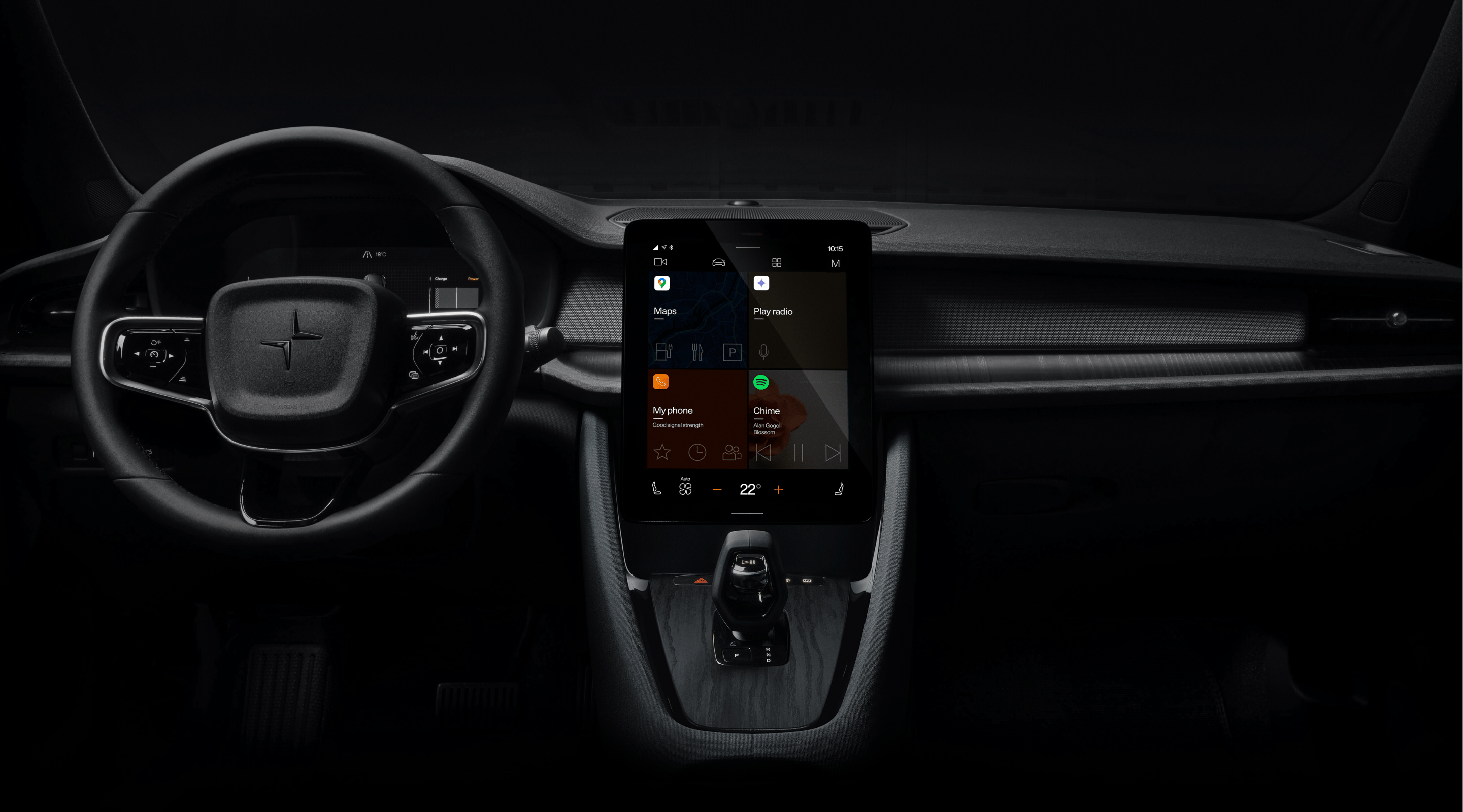 Polestar 2’s dashboard area with the steering wheel and centre display against a dark background.