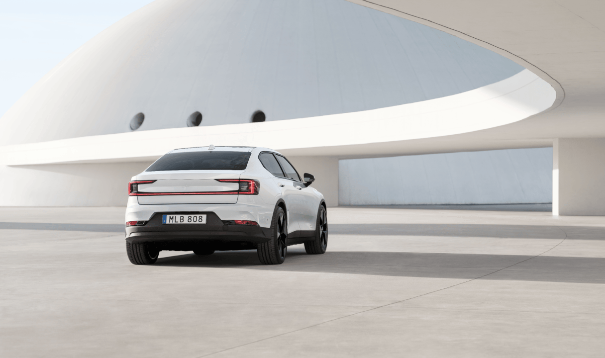 Polestar 2 parked in a modern concrete plaza