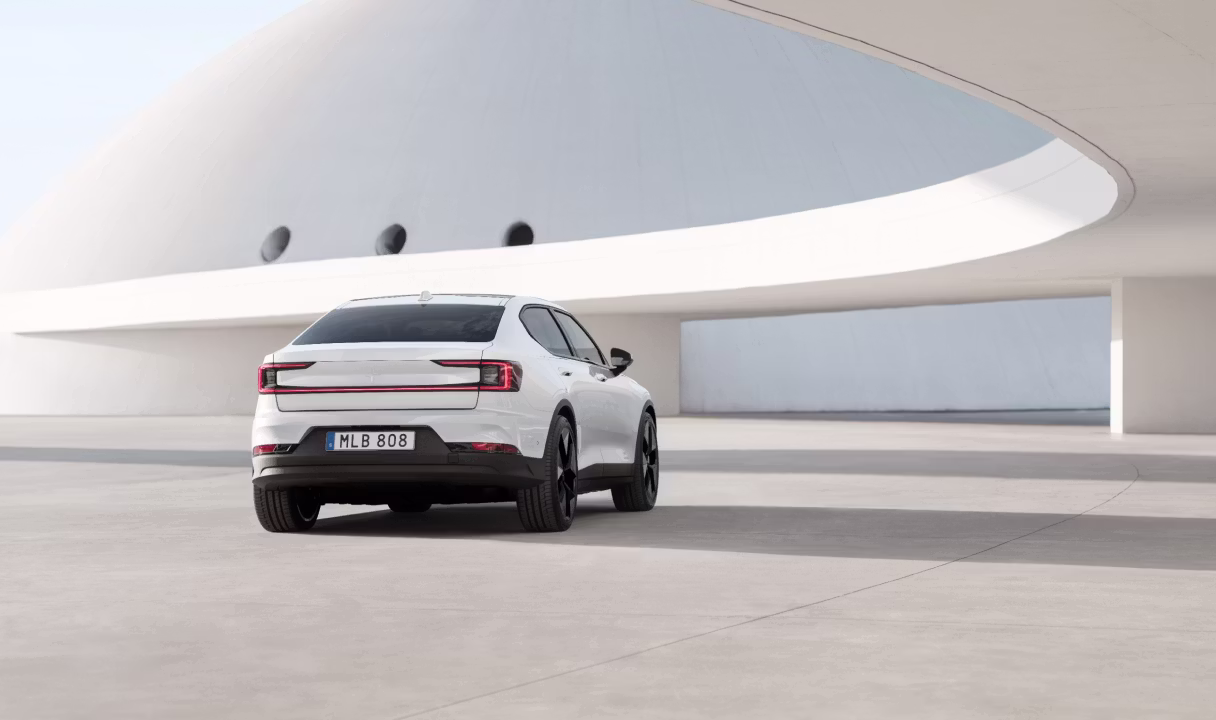 Polestar 2 parked in a modern concrete plaza