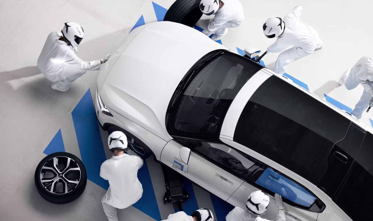 Polestar 2 being assembled by workers in a factory