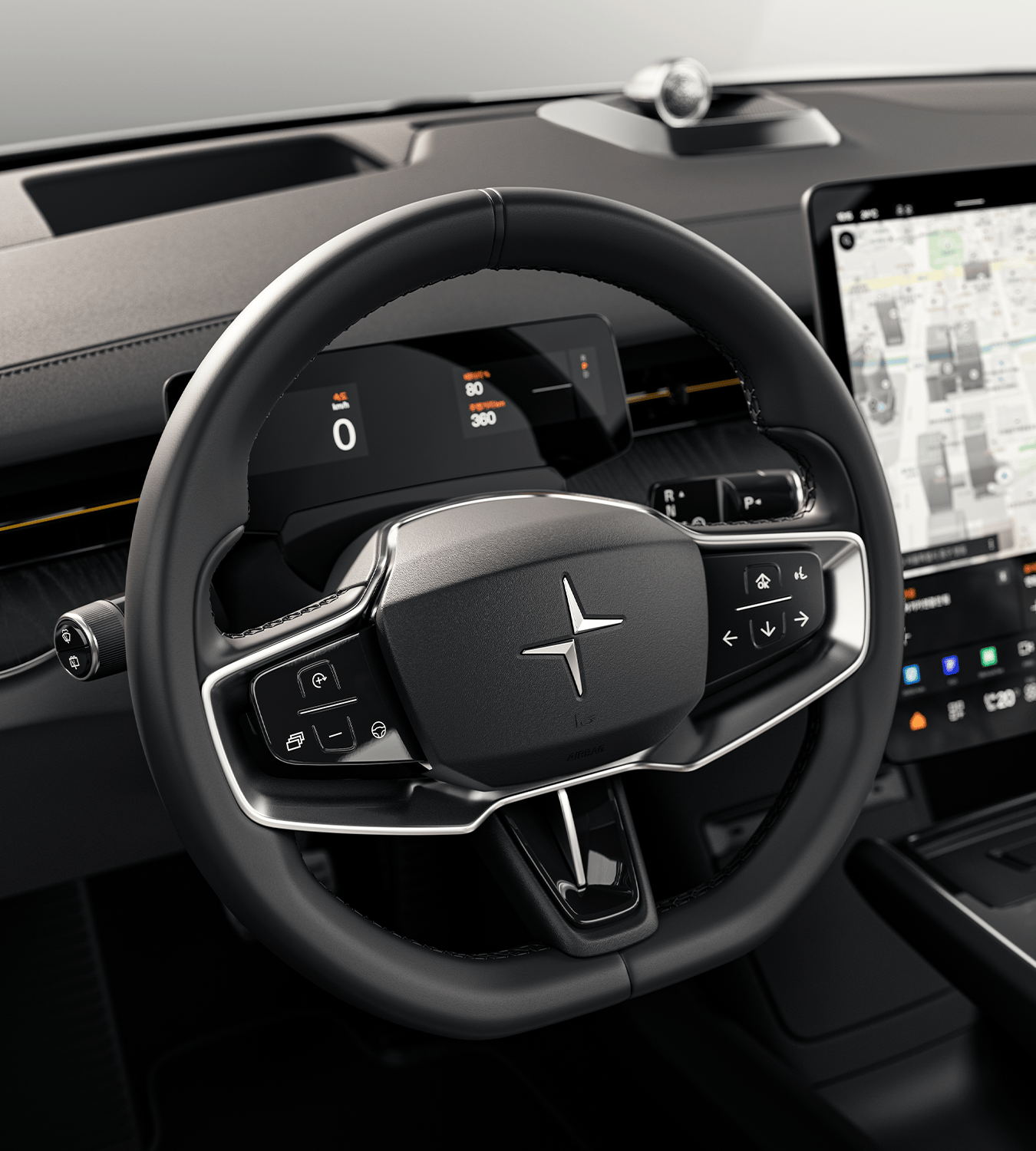 Polestar 3’s steering wheel with silver accents and Polestar logo in front of the driver display.