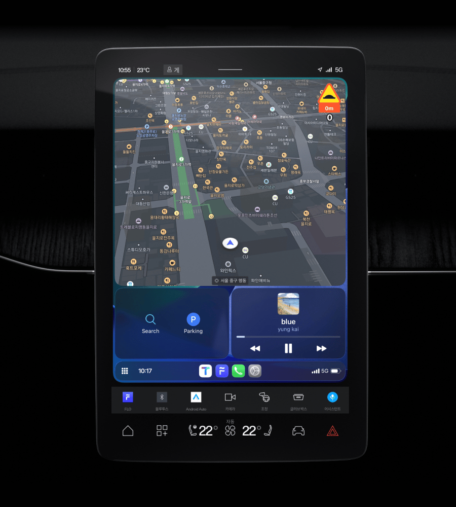 Car dashboard touchscreen showing navigation map and media controls