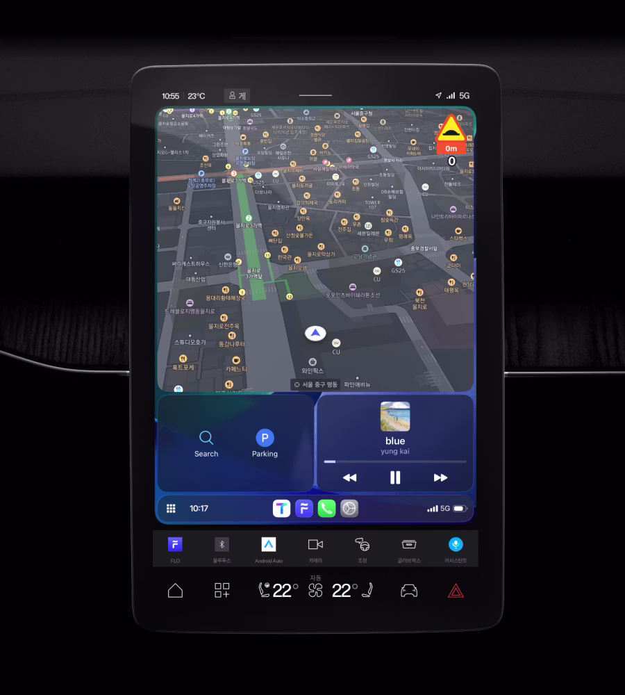 Car dashboard touchscreen showing navigation map and media controls