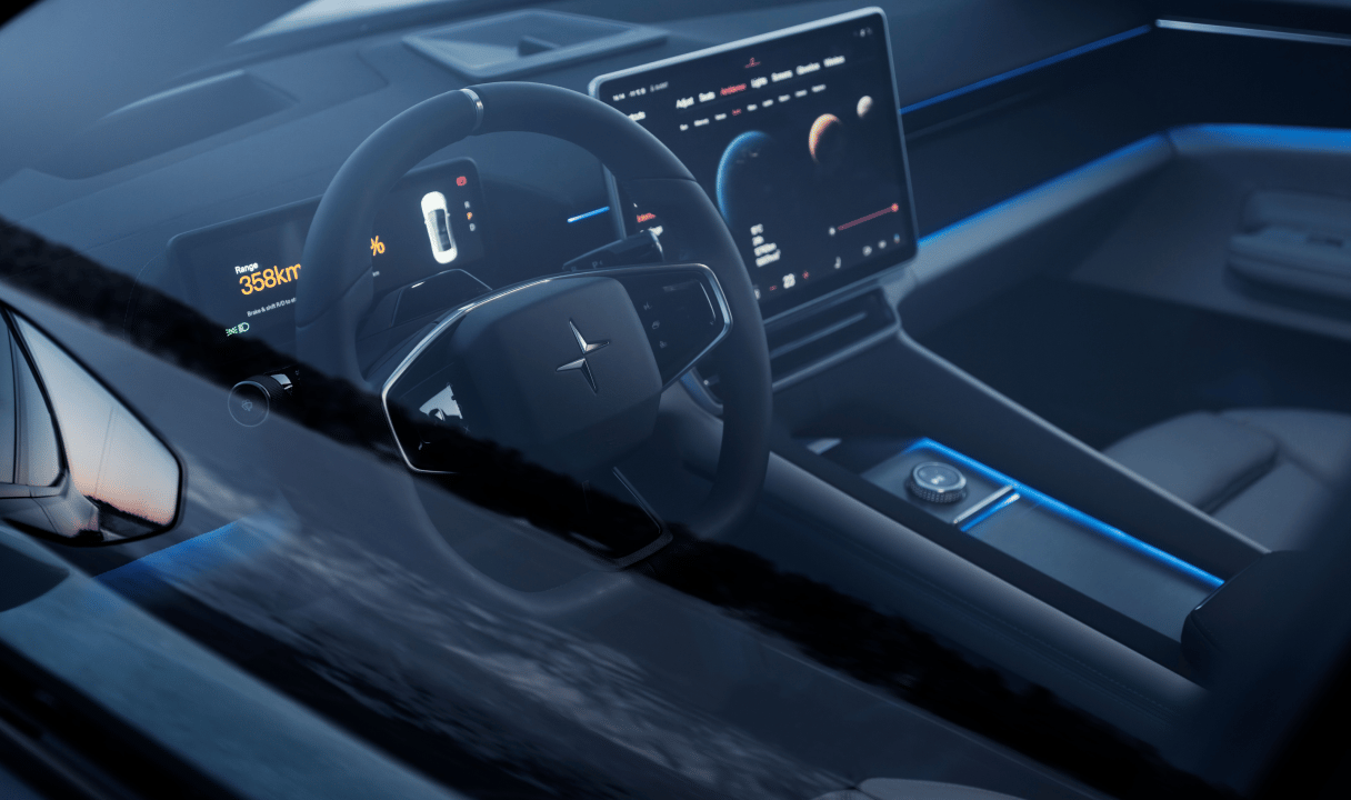Polestar 4 Coupé interior with steering wheel, digital dashboard, and center display