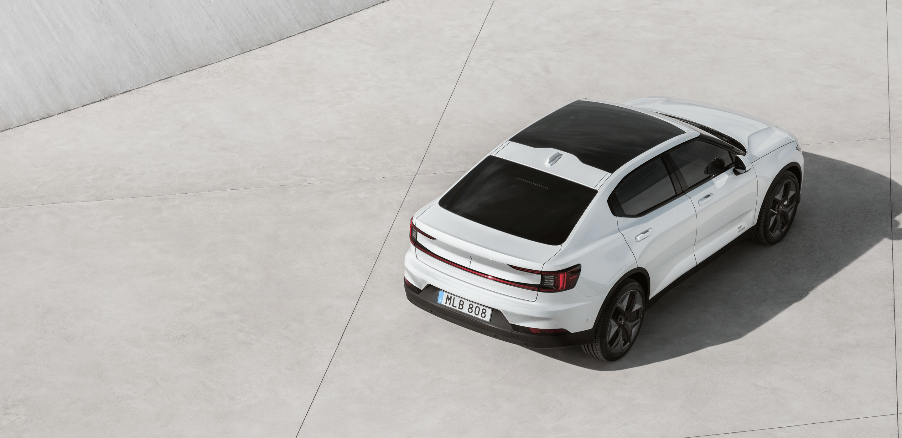 Polestar 2 seen from above on a concrete surface