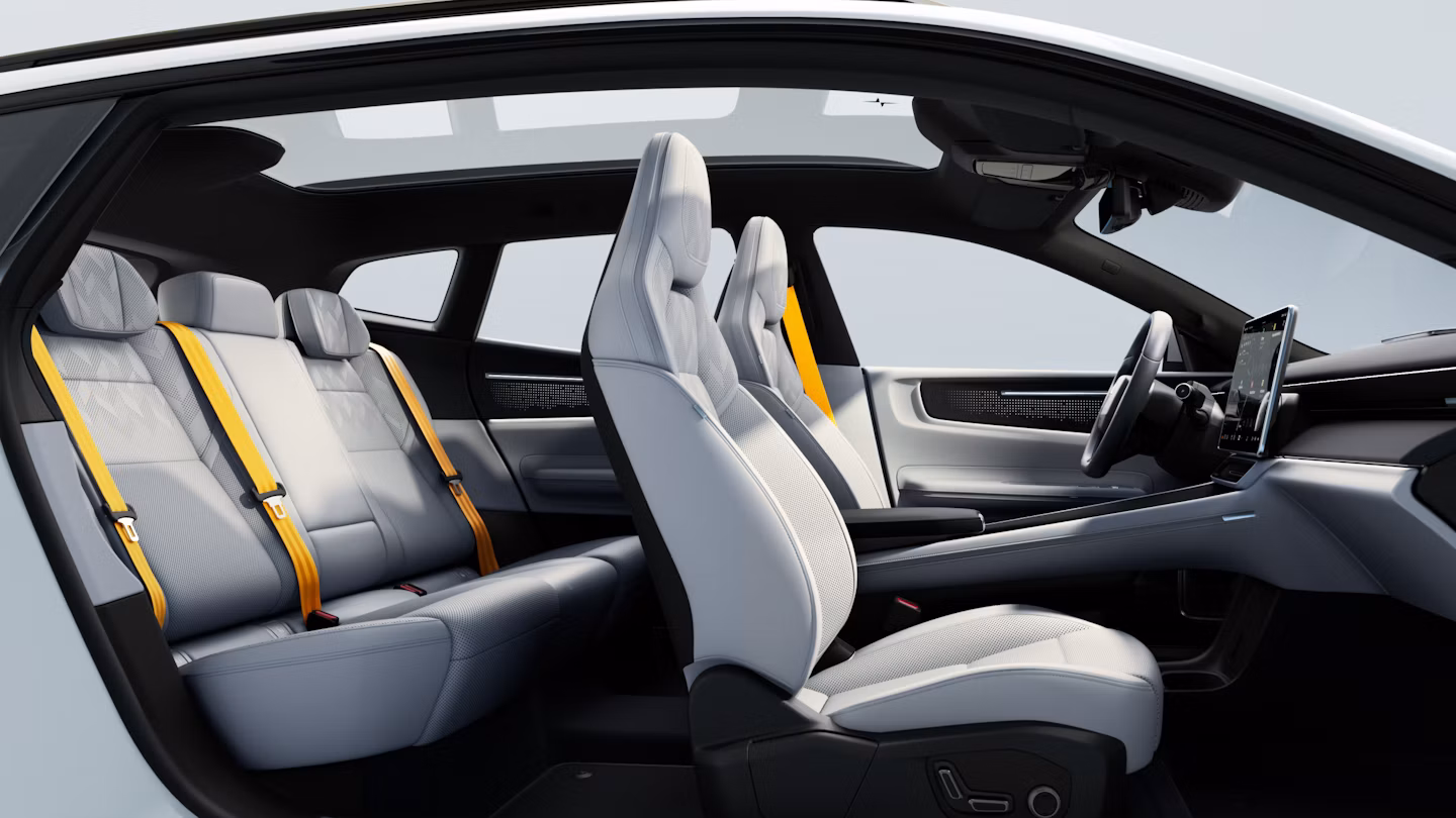 Polestar 4 SUV’s rear seats in Tailored knit upholstery in Mist and gold seat belts.