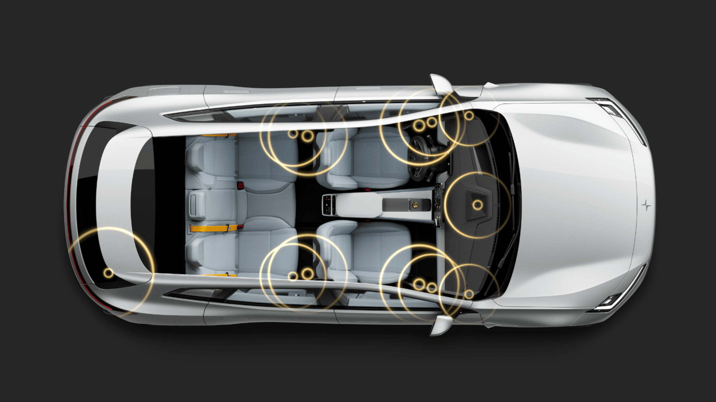 A top-level view of Polestar 4 SUV showing the placement of audio speakers via graphic sound waves.