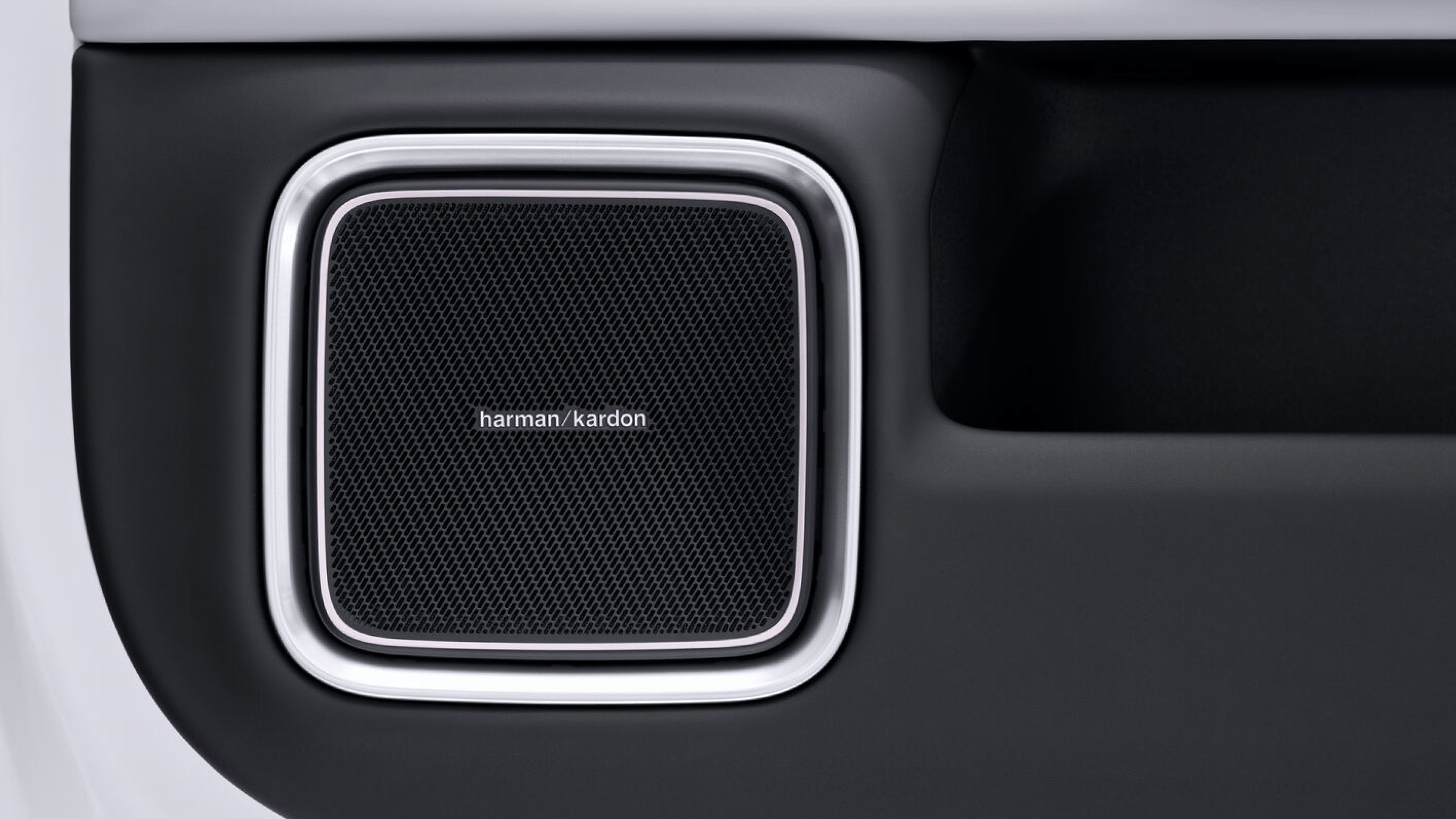 Polestar 4 SUV’s speaker on the door that is included with the optional Harman Kardon audio system.