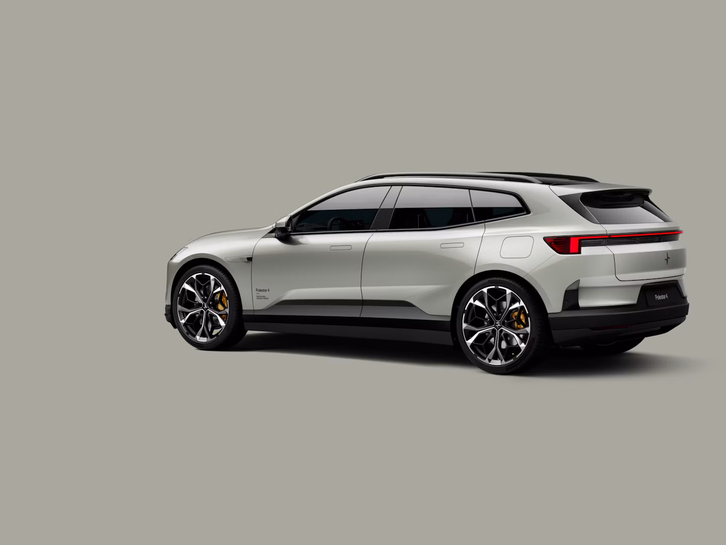 Polestar 4 SUV in color Aurora in rear three-quarter view