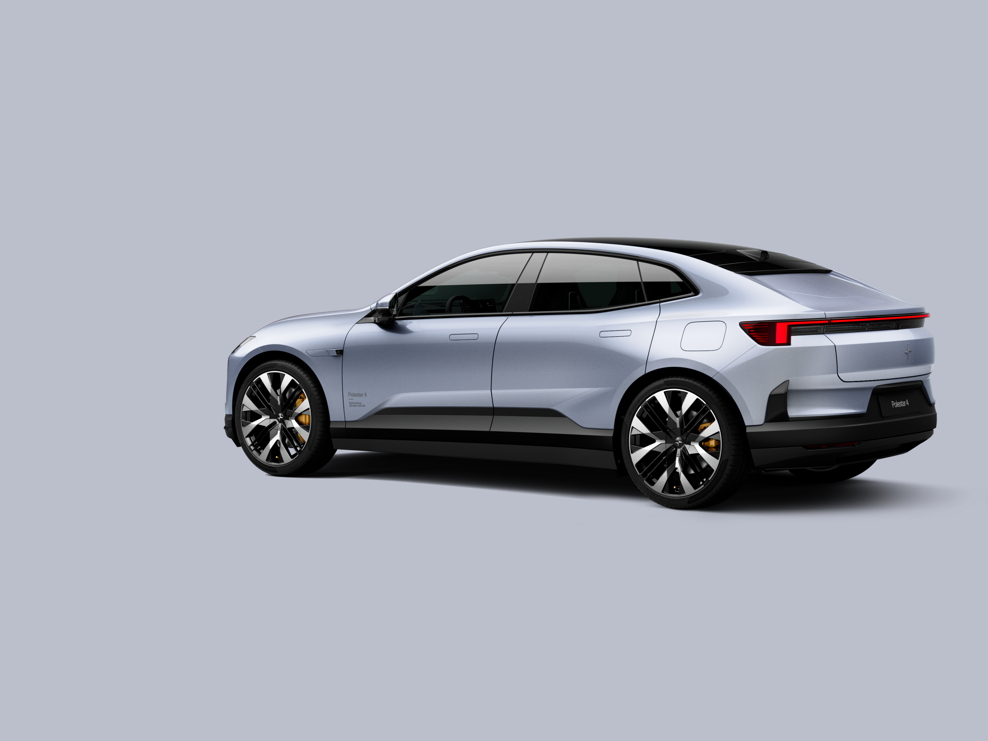 Polestar 4 coupé shown from the rear side on a plain background