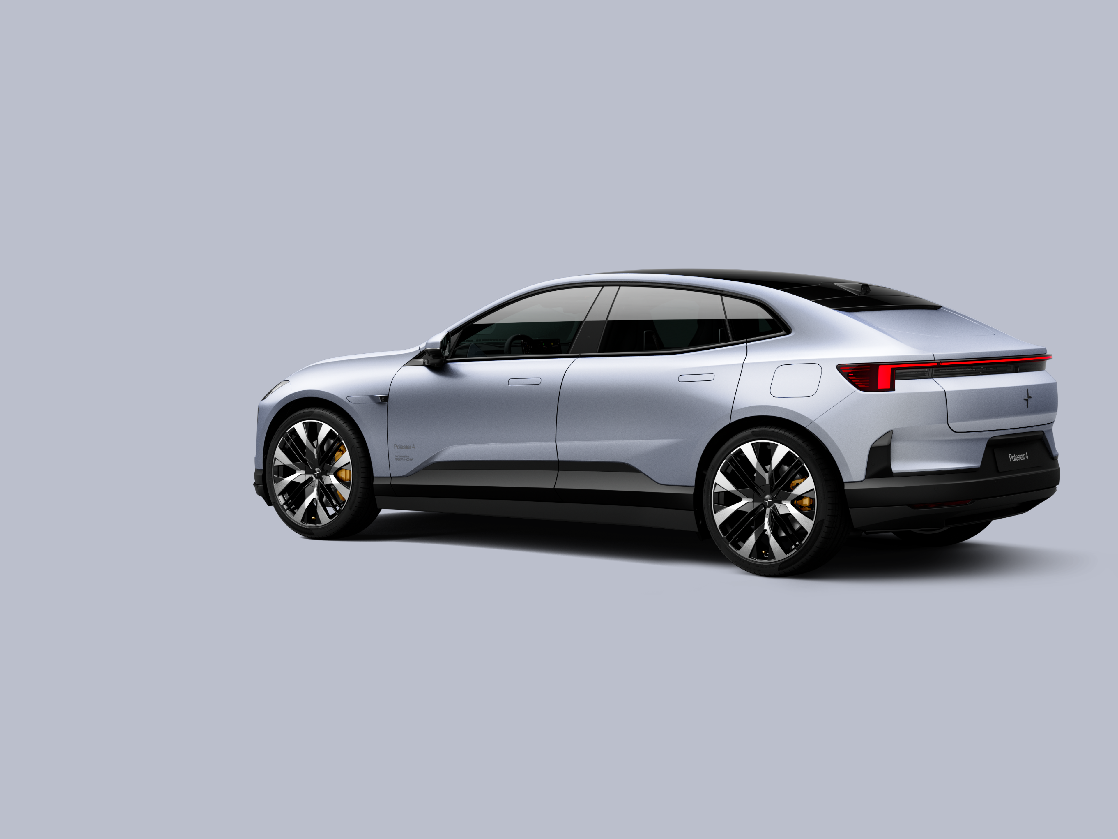 Polestar 4 coupé shown from the rear side on a plain background